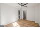 Bright bedroom with wood floors and ceiling fan at 425 Meadowbrook Dr, Mcdonough, GA 30253