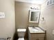 Clean basement bathroom with granite vanity and updated fixtures at 2852 Port Royal Ln, Decatur, GA 30034