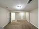 Spacious basement bedroom with carpeted floor and multiple closets at 2852 Port Royal Ln, Decatur, GA 30034