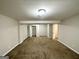 Spacious basement bedroom with carpet, closet, and access to other areas at 2852 Port Royal Ln, Decatur, GA 30034