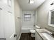 Clean bathroom with a bathtub, toilet, and granite vanity at 2852 Port Royal Ln, Decatur, GA 30034