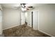 Spacious bedroom with neutral colored walls and carpeted floors at 2852 Port Royal Ln, Decatur, GA 30034