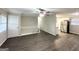 Living area with hardwood floor, white doors, and kitchen access at 2852 Port Royal Ln, Decatur, GA 30034