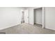 Spacious bedroom with ample closet space and neutral decor at 6864 Fielder Rd, Rex, GA 30273