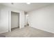 Spacious bedroom with walk-in closet and neutral carpeting at 6864 Fielder Rd, Rex, GA 30273