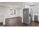 Bright dining area with hardwood floors and a view to the backyard at 6864 Fielder Rd, Rex, GA 30273