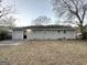 Simple backyard with a concrete patio and lawn at 2030 Fargo Se Pl, Atlanta, GA 30316