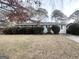 Gray exterior house with landscaping and a driveway at 2030 Fargo Se Pl, Atlanta, GA 30316