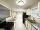Modern kitchen with granite countertops and stainless steel appliances at 2030 Fargo Se Pl, Atlanta, GA 30316