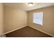 Simple bedroom with neutral walls and carpet at 3800 Clovis Nw Ct, Atlanta, GA 30331