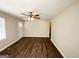 Spacious living room with dark laminate wood flooring at 3800 Clovis Nw Ct, Atlanta, GA 30331