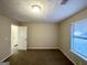 Spacious bedroom with neutral walls and carpet at 4864 Brookstone Pkwy, Ellenwood, GA 30294