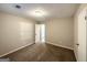 Well-lit bedroom with access to another room at 4864 Brookstone Pkwy, Ellenwood, GA 30294