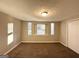 Spacious bedroom with neutral decor at 4864 Brookstone Pkwy, Ellenwood, GA 30294