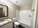 Clean bathroom, featuring a bathtub and granite countertop at 2252 Wellington Hills Way, Snellville, GA 30039