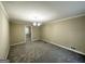 Formal dining room with neutral wall colors and carpet at 2252 Wellington Hills Way, Snellville, GA 30039