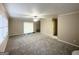 Living room with sliding glass door and neutral decor at 2252 Wellington Hills Way, Snellville, GA 30039