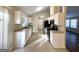 Modern kitchen with white cabinets, stainless steel appliances, and granite counters at 2312 Leslie Brook Dr, Decatur, GA 30035