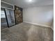 Bedroom with stone accent wall and mirrored closet at 2987 Medina Dr, Jonesboro, GA 30236