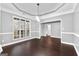 Formal dining room with hardwood floors and neutral walls at 409 Bellway Ct, Tyrone, GA 30290