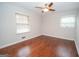 Spacious bedroom with hardwood floors and ceiling fan at 101 Azalea Dr, Peachtree City, GA 30269