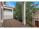 Private deck overlooking backyard with metal railing at 837 Inman Village Ne Pkwy, Atlanta, GA 30307