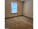 Bright bedroom with neutral carpeting at 240 Chambers Rd, Mcdonough, GA 30253