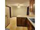 Kitchen with wood cabinets and tile floor at 240 Chambers Rd, Mcdonough, GA 30253