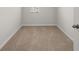 Small bedroom with carpeted floor and a window at 11879 Aukerman Way # 128, Hampton, GA 30228