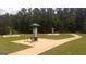 Outdoor fitness area with multiple exercise stations and a walking path at 11879 Aukerman Way # 128, Hampton, GA 30228