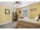 Cozy bedroom featuring a double bed and plenty of natural light at 1385 Kenilworth Sw Dr, Atlanta, GA 30310