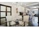 Modern kitchen with white cabinets, granite countertops, and stainless steel appliances at 1385 Kenilworth Sw Dr, Atlanta, GA 30310