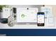 Smart home features, including smart thermostat, security system, and keyless entry at 1705 Goodwin Dr, Hampton, GA 30228