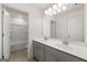 Modern bathroom with double vanity, a large mirror, and a tub shower combo at 1705 Goodwin Dr # 28, Hampton, GA 30228