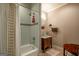 Bathroom with shower/tub combo and glass vessel sink at 320 Massengale Rd, Brooks, GA 30205