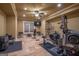 Basement home gym with various exercise equipment at 320 Massengale Rd, Brooks, GA 30205