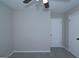 Bedroom with two closets and ceiling fan at 321 Summerwood Ln, Stockbridge, GA 30281