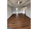 Spacious bedroom with hardwood floors and ceiling fan at 7976 Cedar Mall, Fairburn, GA 30213