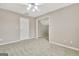 Spacious bedroom with carpet and ceiling fan at 355 Woodbyne Dr, Fayetteville, GA 30214