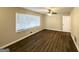 Large bedroom featuring hardwood floors and ceiling fan at 239 Silver Springs Sw Cir, Atlanta, GA 30310