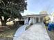 Updated ranch home features a covered carport and landscaped yard at 239 Silver Springs Sw Cir, Atlanta, GA 30310