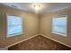 Well-lit bedroom featuring neutral walls and wall-to-wall carpet at 3438 Maryvale Dr, Decatur, GA 30032
