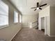 Spacious bonus room with carpet and access to upstairs at 3438 Maryvale Dr, Decatur, GA 30032