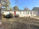 Newly renovated Ranch home with red front door and landscaping at 3438 Maryvale Dr, Decatur, GA 30032