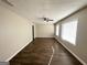 Spacious living room with hardwood floors and ceiling fan at 3438 Maryvale Dr, Decatur, GA 30032