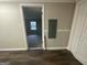 View of hallway with doors leading to other rooms and a glimpse of a window at 45 North Ave, Hampton, GA 30228