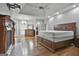 Large main bedroom with hardwood floors and fireplace at 164 Snead Rd, Fayetteville, GA 30215