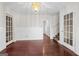 Living room with hardwood floors and staircase access at 1031 Pinecrest Dr, Forest Park, GA 30297