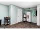 Basement laundry area with storage and hanging rod at 2800 S Highway 16, Carrollton, GA 30116