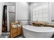 Spa-like bathroom with a soaking tub and shower at 2800 S Highway 16, Carrollton, GA 30116